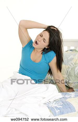 Beautiful woman waking up in the morning View Large Photo Image Stock Image - Beautiful woman waking up in the morning. Fotosearch