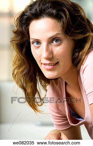 Stock Photography - beauty, blue eyes, brown hair, chestnut hair. Fotosearch