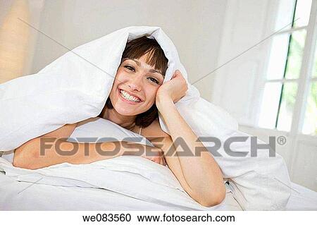 bed, brunette, bedroom, at-home View Large Photo Image Stock Image - bed, brunette, bedroom, at-home. Fotosearch