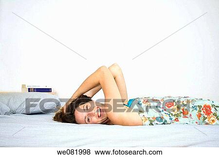 bed, chestnut hair, brown hair, at-home View Large Photo Image Stock Photo - bed, chestnut hair, brown hair, at-home. Fotosearch