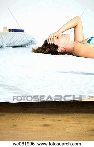 bed, chestnut hair, brown hair, at-home View Large Photo Image Stock Photograph - bed, chestnut hair, brown hair, at-home. Fotosearch