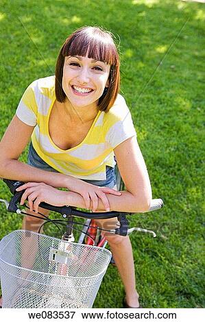 bicycle, break, break-time, brunette View Large Photo Image Stock Photo - bicycle, break, break-time, brunette. Fotosearch