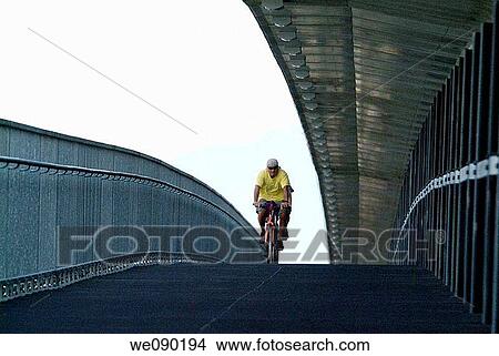 Picture - bicycle path on Canada Line bridge over the Fraser River, Vancouver, BC, Canada. Fotosearch