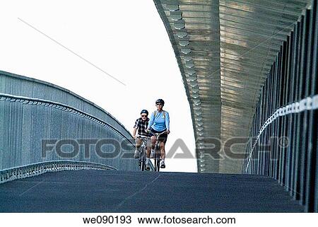 Stock Image - bicycle path on Canada Line bridge over the Fraser River, Vancouver, BC, Canada. Fotosearch