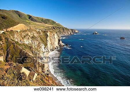 Big Sur is a sparsely populated region of the central California coast where the Santa Lucia Mountains rise abruptly from the Pacific Ocean View Large Photo Image Stock Image - Big Sur is a sparsely populated region of the central California coast where the Santa Lucia Mountains rise abruptly from the Pacific Ocean. Fotosearch