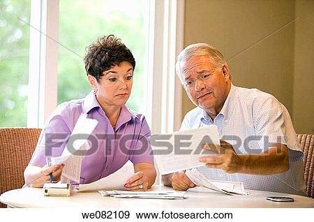 bill, checking, check, at-home View Large Photo Image Stock Photo - bill, checking, check, at-home. Fotosearch