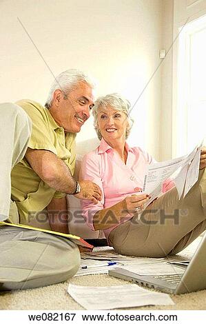 bill, checking, check, at-home View Large Photo Image Stock Photo - bill, checking, check, at-home. Fotosearch