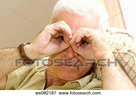Stock Photo - binocular, Close-up, at-home. Fotosearch