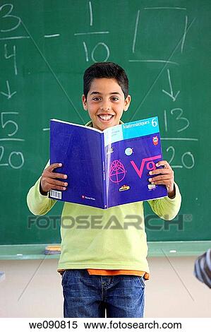 black hair, blackboard, board, book, boy, chalkboard View Large Photo Image Stock Photography - black hair, blackboard, board, book, boy, chalkboard. Fotosearch