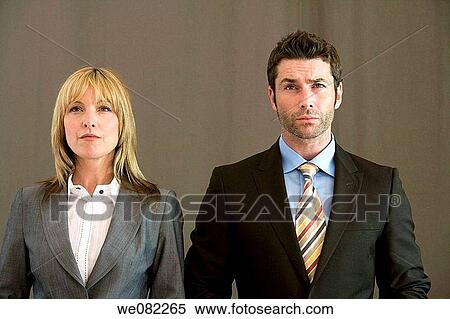 Stock Photography - black hair, blond, business, businessman, businesspeople. Fotosearch