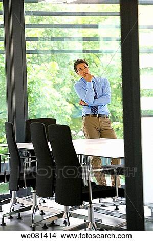 black hair, business, board-room, absorbed View Large Photo Image Picture - black hair, business, board-room, absorbed. Fotosearch