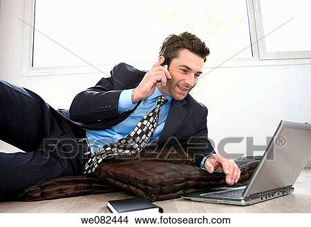 Picture - black hair, business, businessman, businesspeople, calling. Fotosearch