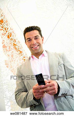 Stock Photo - black hair, business, cell phone. Fotosearch