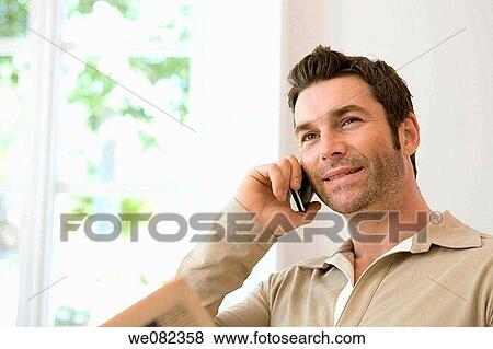black hair, cell phone, calling, at-home View Large Photo Image Stock Photo - black hair, cell phone, calling, at-home. Fotosearch
