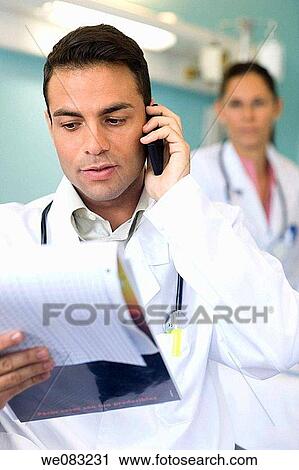 black hair, cell phone, calling, Attache case View Large Photo Image Stock Image - black hair, cell phone, calling, Attache case. Fotosearch