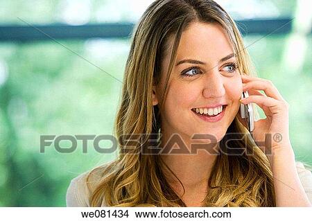 Picture - blond, blue eyes, business, calling. Fotosearch