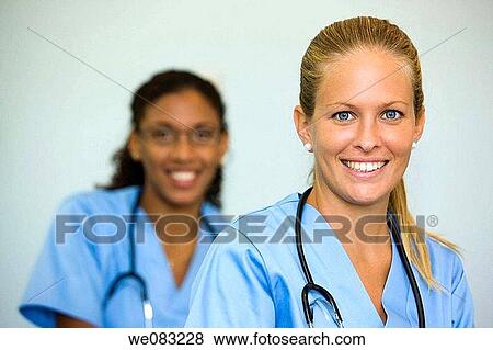 Stock Photo - blond, blue eyes, doctor. Fotosearch