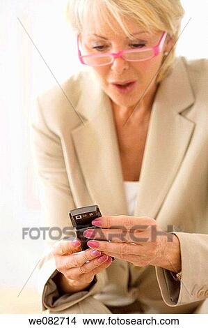 blond, business, cell phone View Large Photo Image Picture - blond, business, cell phone. Fotosearch