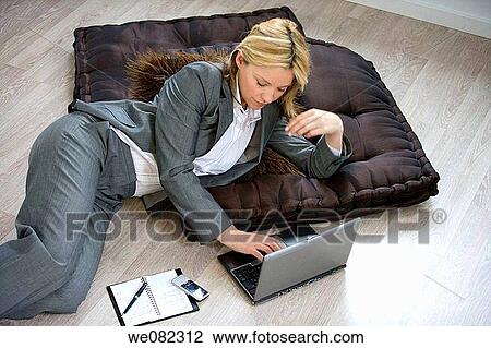 Stock Image - blond, businesswoman, businesspeople, business, agenda. Fotosearch