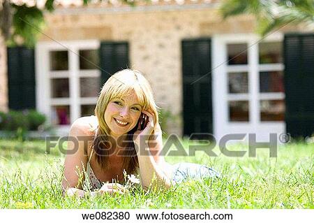 Stock Image - blond, calling, calm. Fotosearch