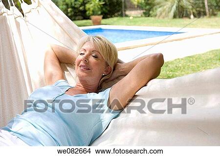 blond, calm, chilling out View Large Photo Image Picture - blond, calm, chilling out. Fotosearch