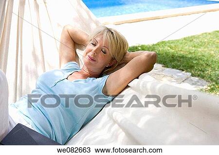 blond, calm, chilling out View Large Photo Image Stock Image - blond, calm, chilling out. Fotosearch