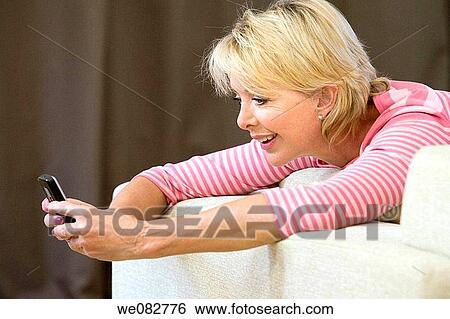 blond, cell phone, addiction View Large Photo Image Stock Photograph - blond, cell phone, addiction. Fotosearch