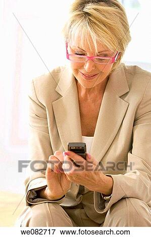 blond, cell phone, communication View Large Photo Image Stock Photo - blond, cell phone, communication. Fotosearch