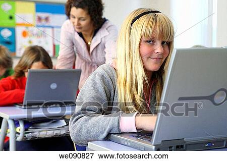 Stock Photo - blond, child, classroom. Fotosearch