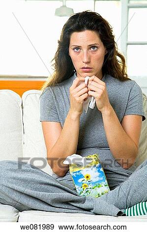 Stock Photo - blue eyes, brown hair, at-home. Fotosearch