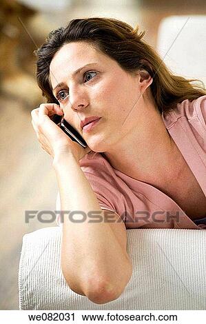 blue eyes, brown hair, calling, cell phone View Large Photo Image Stock Image - blue eyes, brown hair, calling, cell phone. Fotosearch