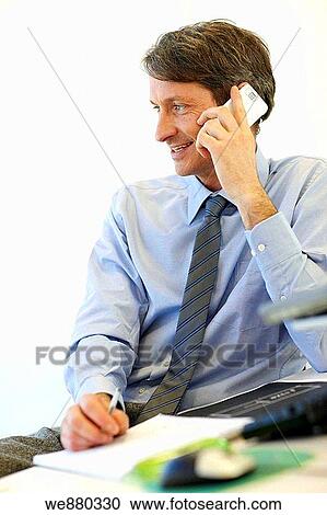 Stock Image - blue eyes, business, businessman, businesspeople, calling. Fotosearch