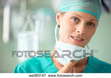 Stock Photo - blue eyes, cap, Close-up. Fotosearch