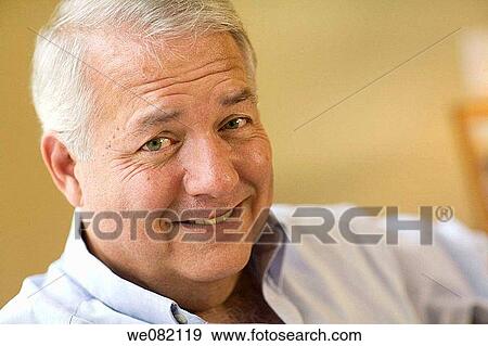Stock Photo - blue eyes, Close-up, at-home. Fotosearch