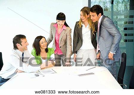 Stock Image - board-room, business, businessman, businesspeople, businesswoman. Fotosearch