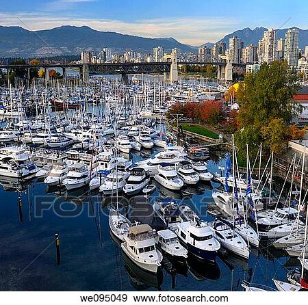 Boats moored at Granville Island Boat Yard and Burrard Marina with bridge and Coastal mountains Vancouver View Large Photo Image Stock Photo - Boats moored at Granville Island Boat Yard and Burrard Marina with bridge and Coastal mountains Vancouver. Fotosearch