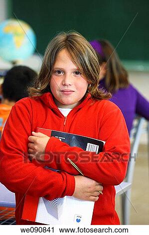 Stock Image - book, boy, child, classroom. Fotosearch