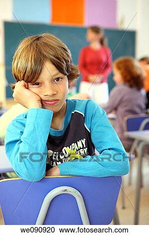 bored, boredom, boy, child, classroom View Large Photo Image Stock Image - bored, boredom, boy, child, classroom. Fotosearch