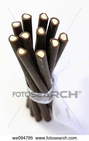 Bound peppermint chocolate sticks standing on end as a gift View Large Photo Image Stock Photography - Bound peppermint chocolate sticks standing on end as a gift. Fotosearch