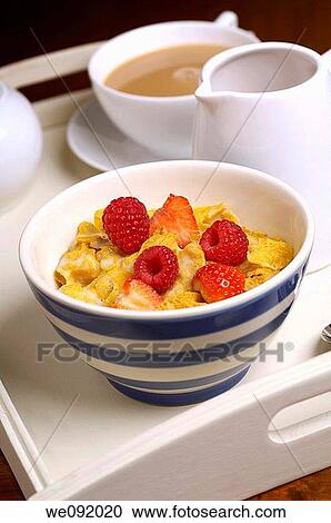 Bowl of cornflakes on breakfast tray View Large Photo Image Stock Image - Bowl of cornflakes on breakfast tray. Fotosearch