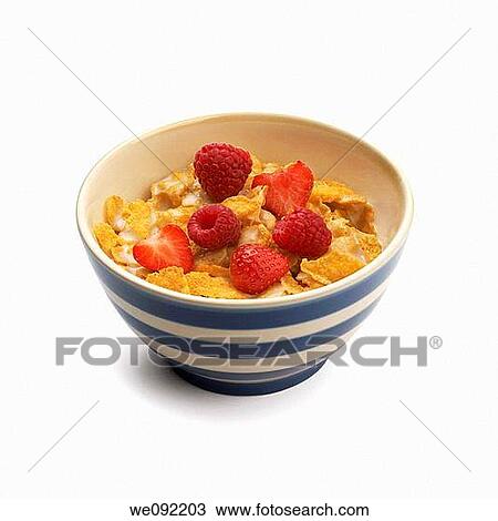 Bowl of cornflakes with strawberries and raspberries View Large Photo Image Stock Image - Bowl of cornflakes with strawberries and raspberries. Fotosearch