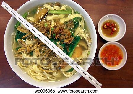 Stock Photography - Bowl Of Noodles, Street Cafe, Singapore. Fotosearch