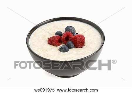 Bowl of Porridge with raspberries and blueberries View Large Photo Image Stock Photography - Bowl of Porridge with raspberries and blueberries. Fotosearch