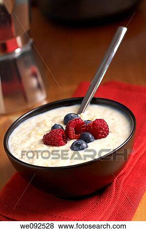 Bowl of Porridge with raspberries, blueberries View Large Photo Image Stock Photo - Bowl of Porridge with raspberries, blueberries. Fotosearch