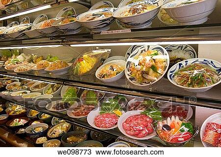 Bowls and plates of plastic Japanese food on display in a store selling fake food displays that restaurants use to show the food they sell inside Kappabashi Street famous for stores selling restaurant supplies, Tokyo, Japan View Large Photo Image Stock Image - Bowls and plates of plastic Japanese food on display in a store selling fake food displays that restaurants use to show the food they sell inside Kappabashi Street famous for stores selling restaurant supplies, Tokyo, Japan. Fotosearch
