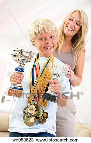 boy, child, champion, at-home View Large Photo Image Stock Image - boy, child, champion, at-home. Fotosearch