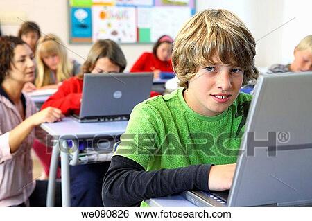 Stock Photograph - boy, child, classroom. Fotosearch