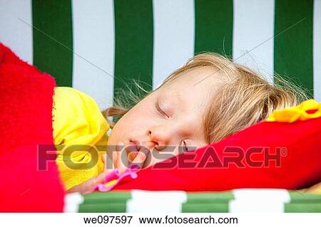 boy with long blond hair sleeping View Large Photo Image Stock Photo - boy with long blond hair sleeping. Fotosearch