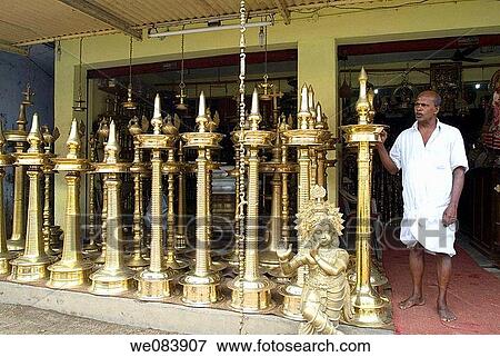 Brass oil lamps shop at Mannar, Kerala, India. View Large Photo Image Stock Photo - Brass oil lamps shop at Mannar, Kerala, India.. Fotosearch
