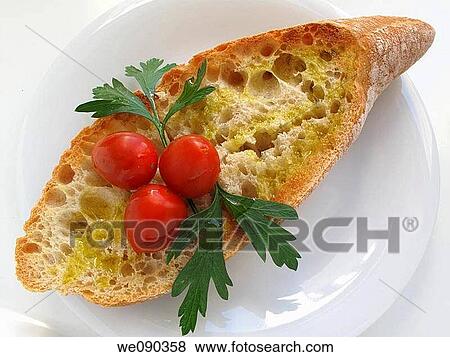 Bread with olive oil, parsley, salt and tomatoes View Large Photo Image Stock Photo - Bread with olive oil, parsley, salt and tomatoes. Fotosearch